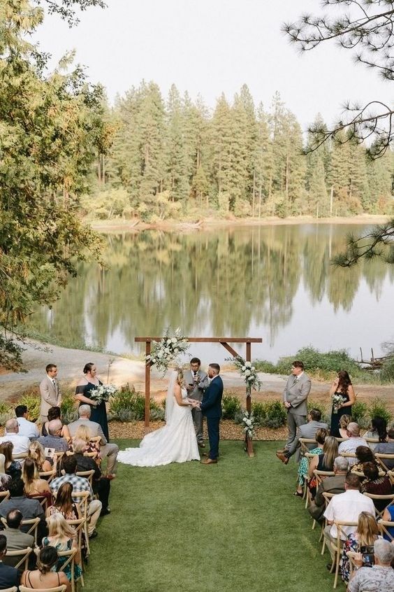Lakeside wedding ceremony on a dock