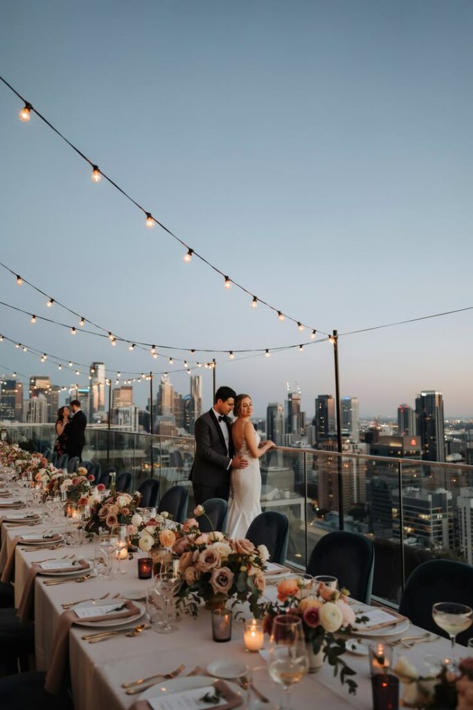 Rooftop wedding with a city skyline